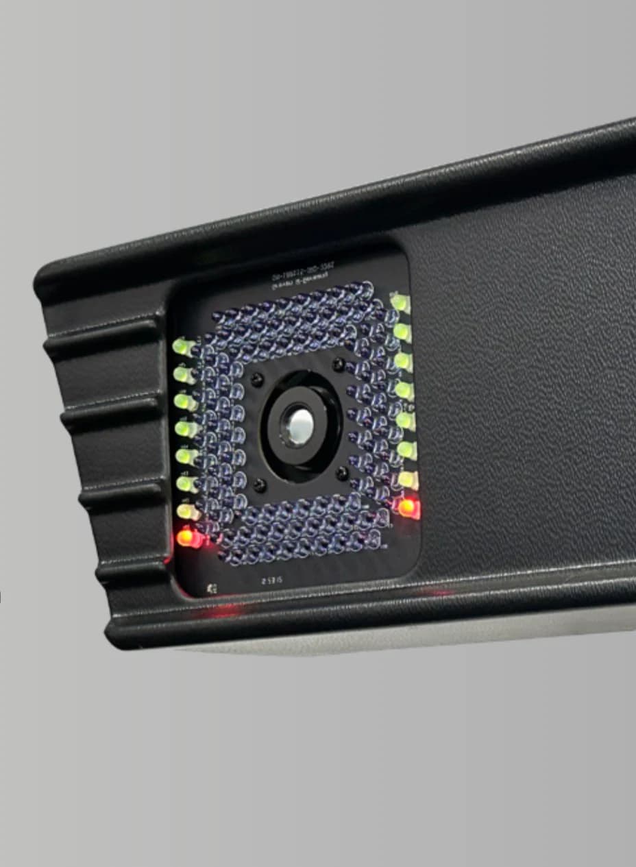 Close-up of the single high-precision camera used by a TreadPlus wheel aligner