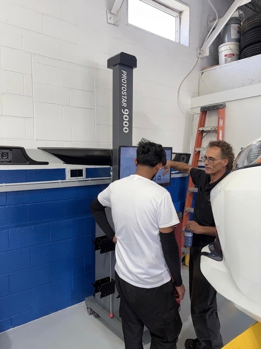 Jamie VanderWier providing TreadPlus 9000 Essential wheel aligner training to a customer in Oakville, Ontario